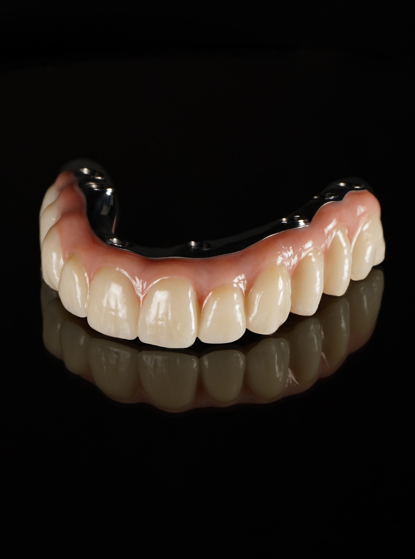 Titanium AOX framework in gloved hand
